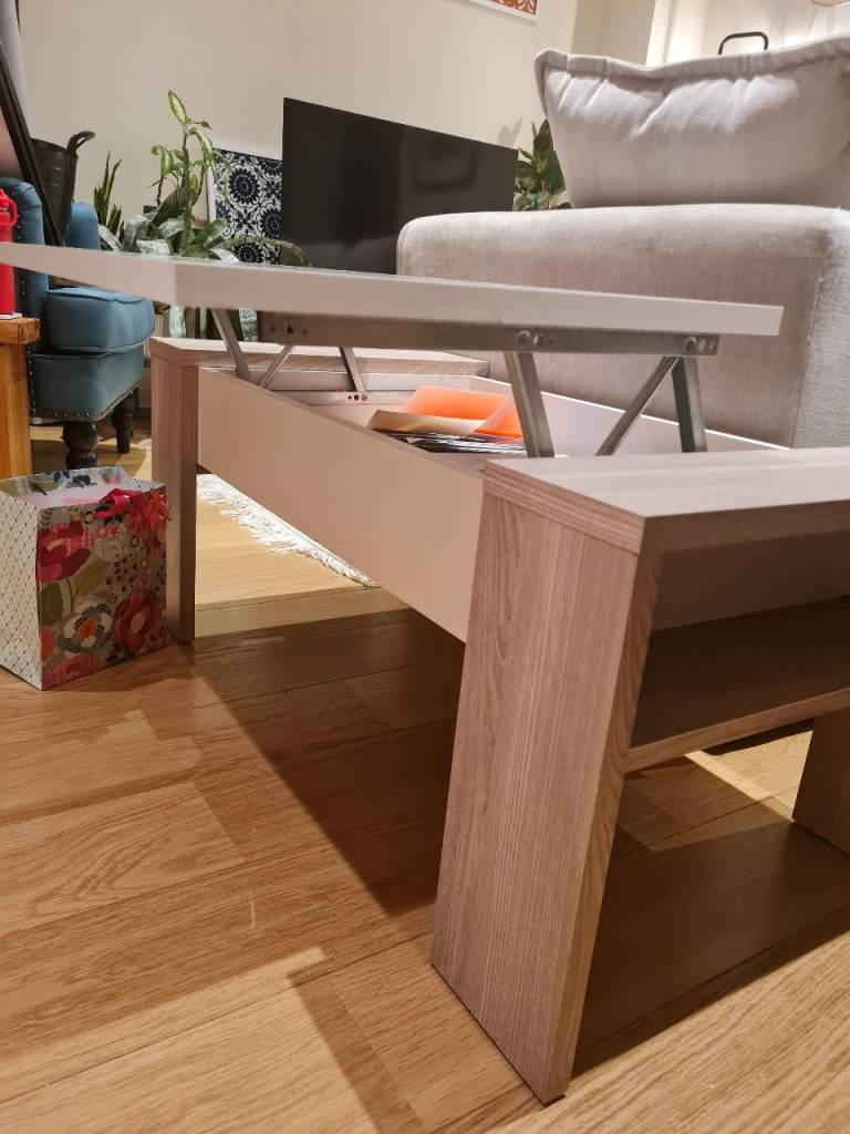 Coffee table with inner drawer