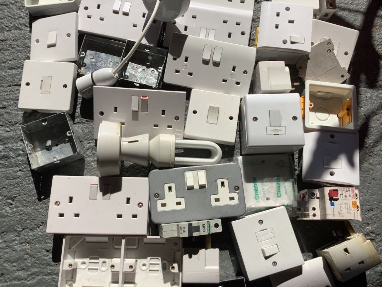 Job lot car boot items electrical sockets electrical items.