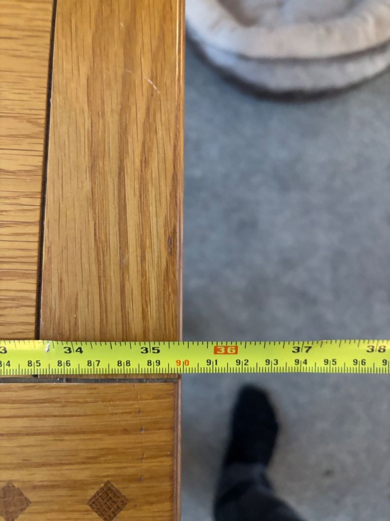 Solid oak dining table and 4 chairs 