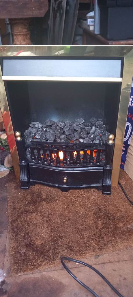 Electric fire effect heater