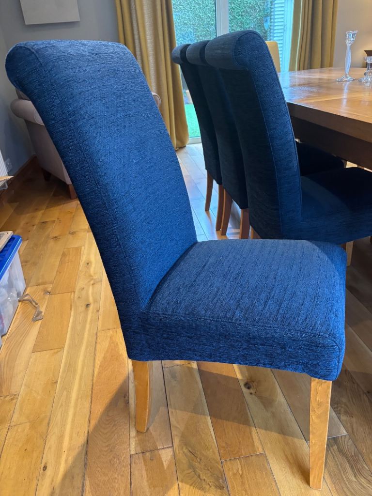 Fabric covered High Back Dining chairs with Oak legs.