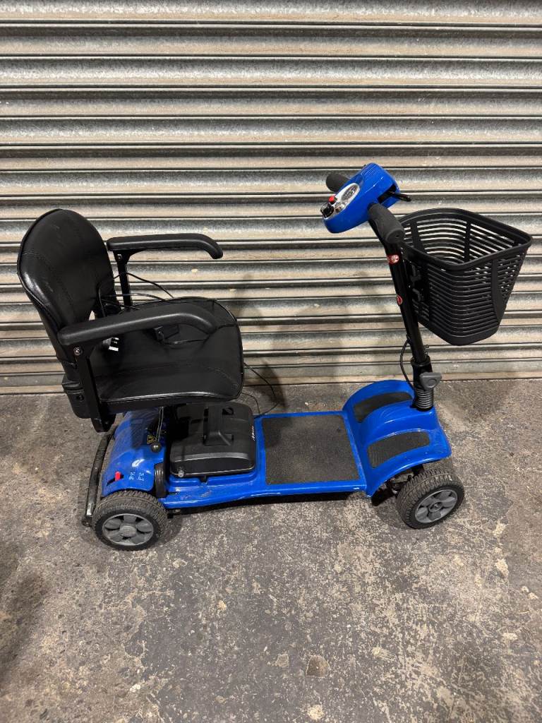 Motion Healthcare eTravel mobility scooter - diagnostic light on