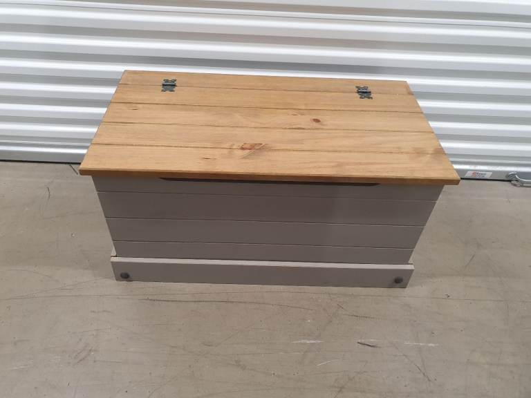 Dunelm ottoman storage chest. 90cm width x 48cm depth x 45cm height. Delivery available for a fee.