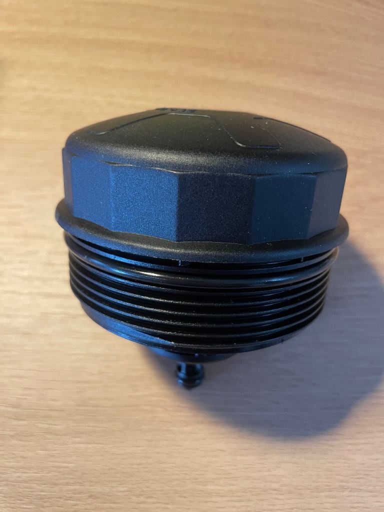Oil filter housing cap