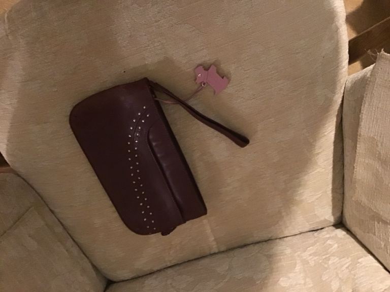 RADLEY CLUTCH BAG. MAROON COLOUR. USED A LITTLE. SELL FOR 40