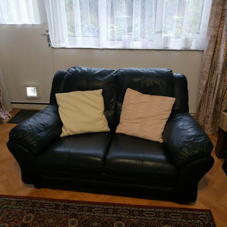 image for 2 seater black leather sofa