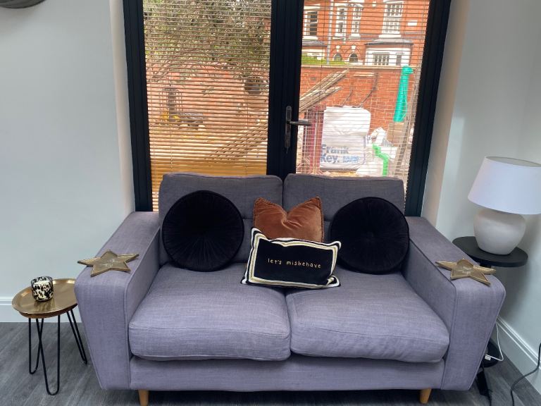 DFS two and three seater sofa and matching footstool. 