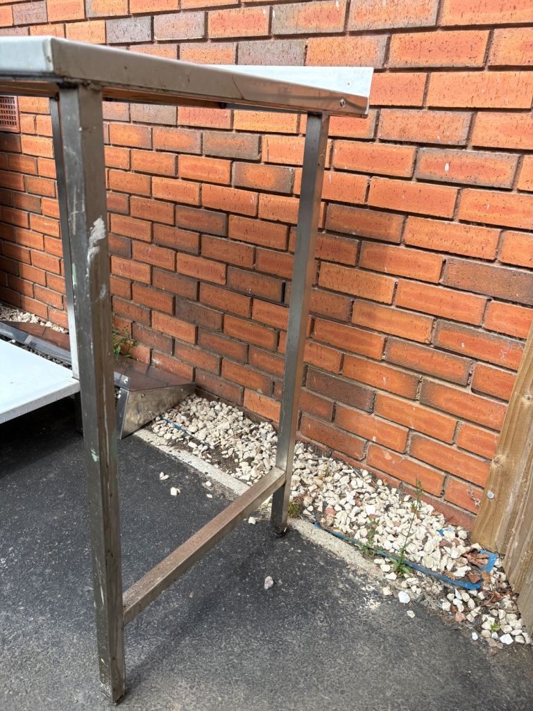 Steel table with under storage (3 available)