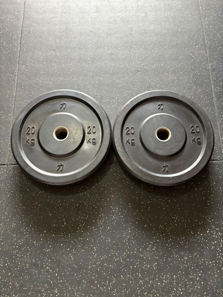 Strength Shop 2x 20kg rubber Olympic bumper plates.