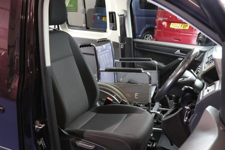 VW CADDY AUTO WHEELCHAIR UPFRONT NEXT TO DRIVER CAR AUTOMATIC MOBILITY WAV 