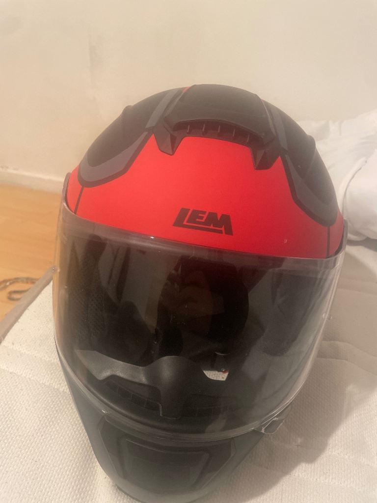 A bike helmet of max size. 