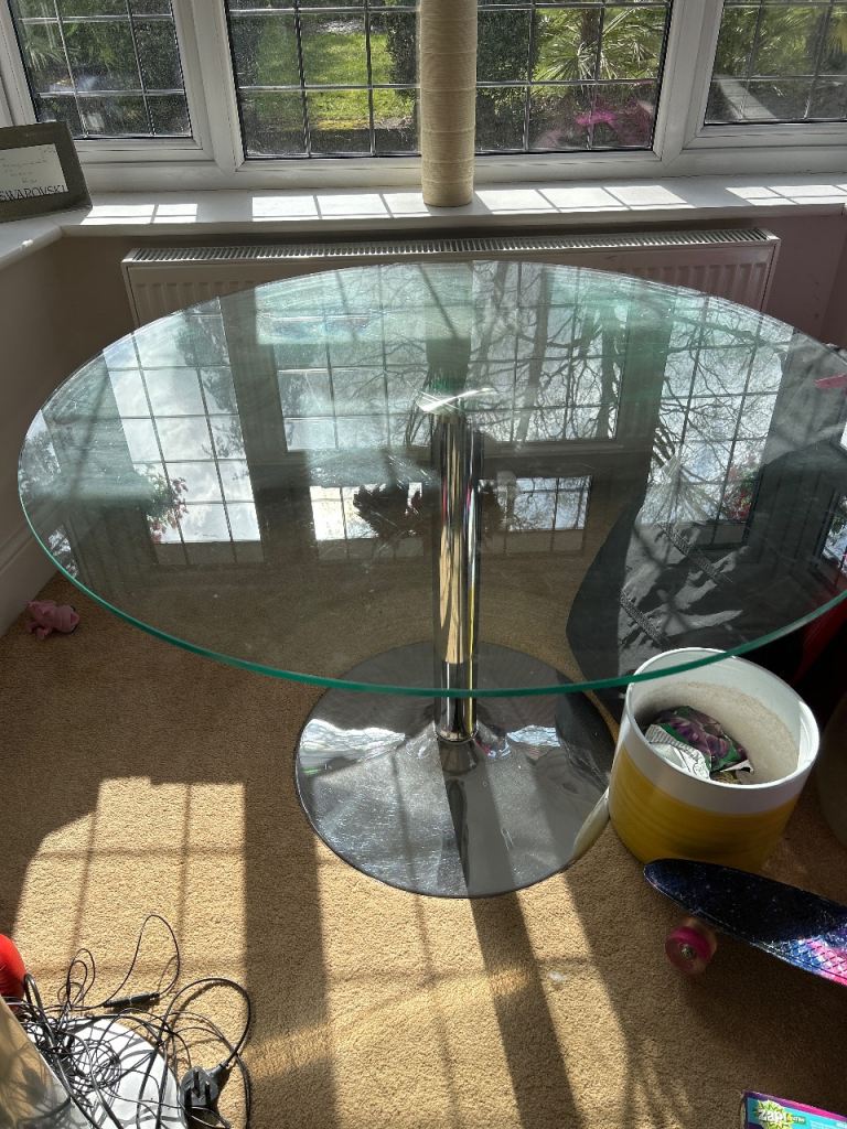 Round glass dining table from DWELL