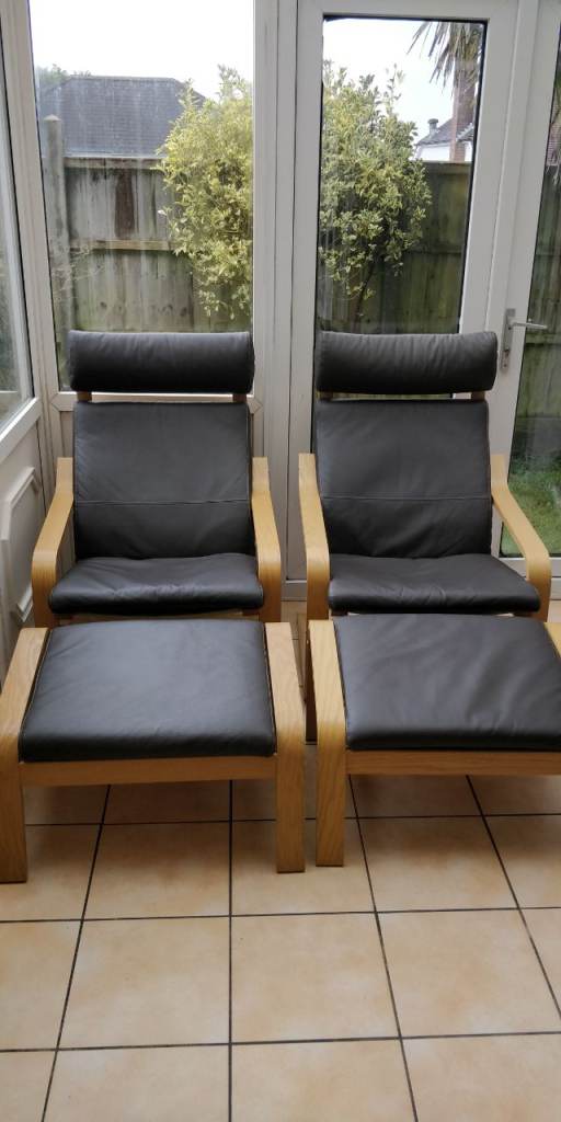 IKEA Poang Two Armchairs with Two Footstools, genuine leather.