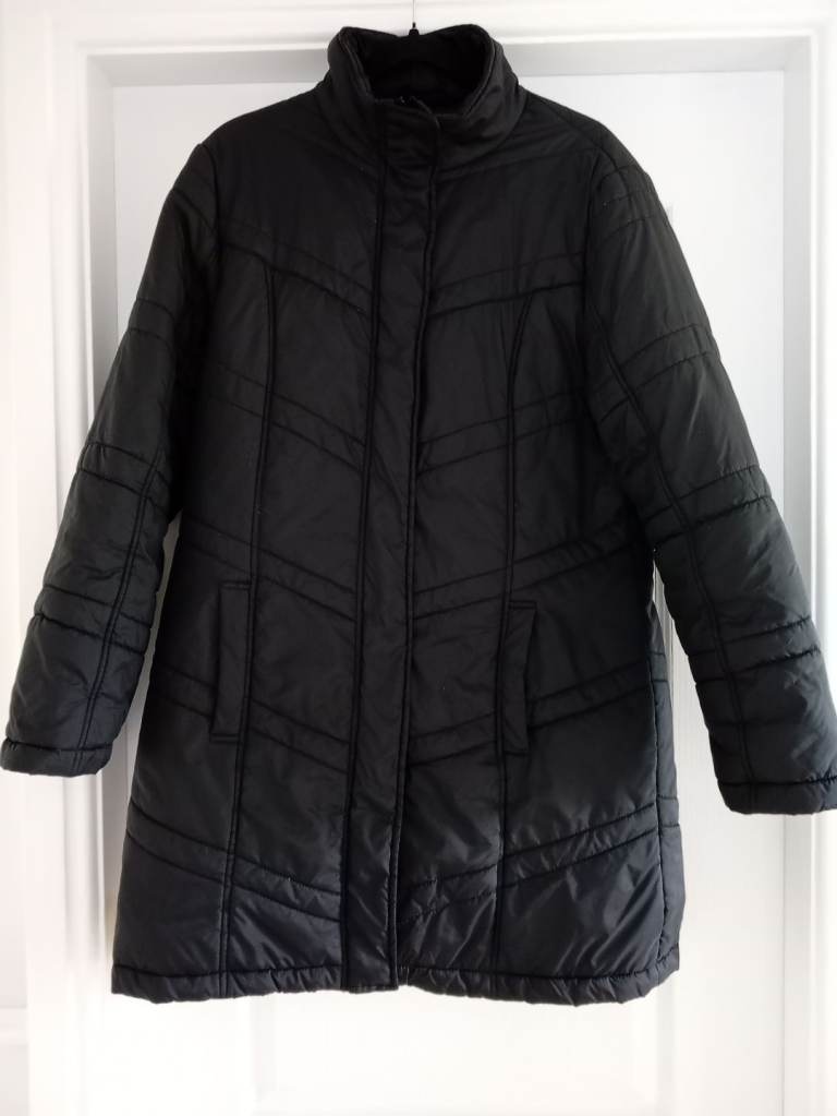 Black coat size 14 by SOUTH COLLECTION in good condition 