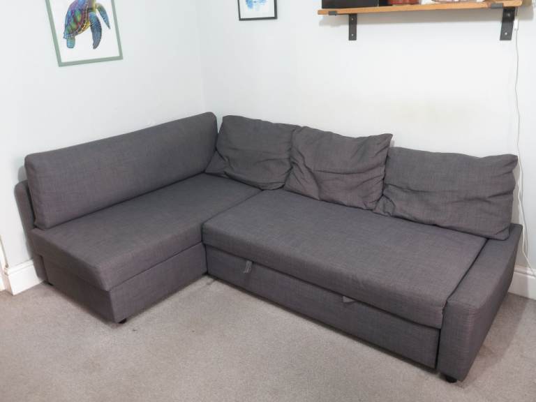 Sofa bed with storage space and mattress pad