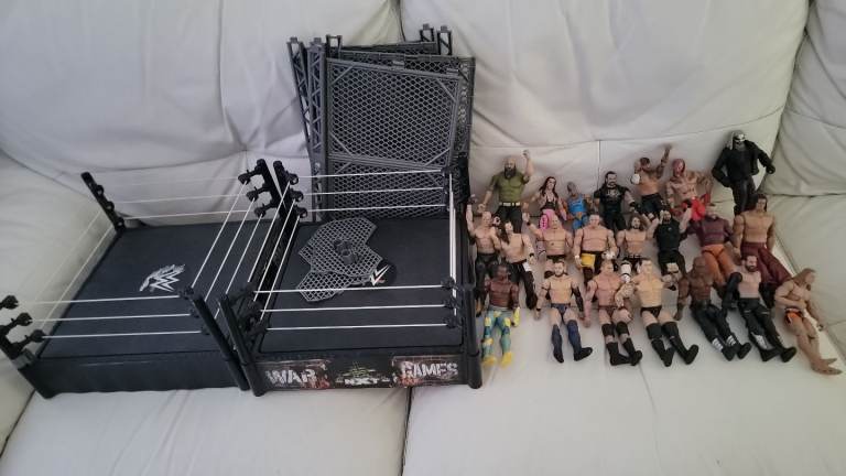 23 wwe figures. Nxt war games rings