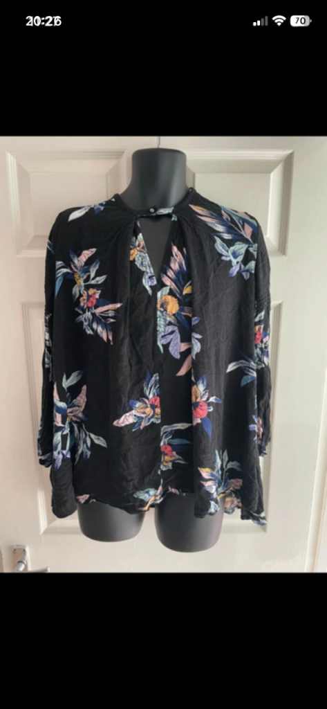 Free people floral long sleeved blouse in size medium