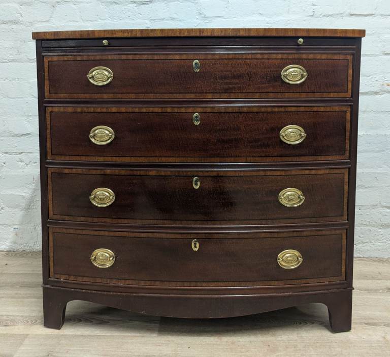 20th century 4 drawer inlaid mahogany bowfront 4 drawer chest by Baker furniture