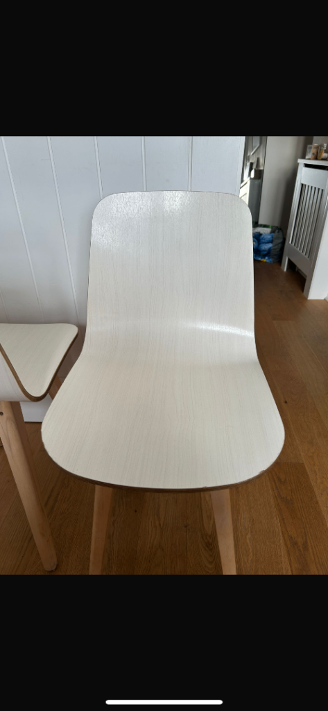 2 wooden dining chairs 