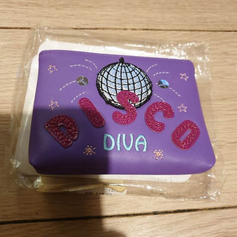 Tula new leather purse.glitzy