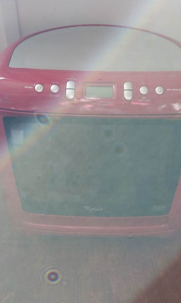 Whirlpool corner shape microwave