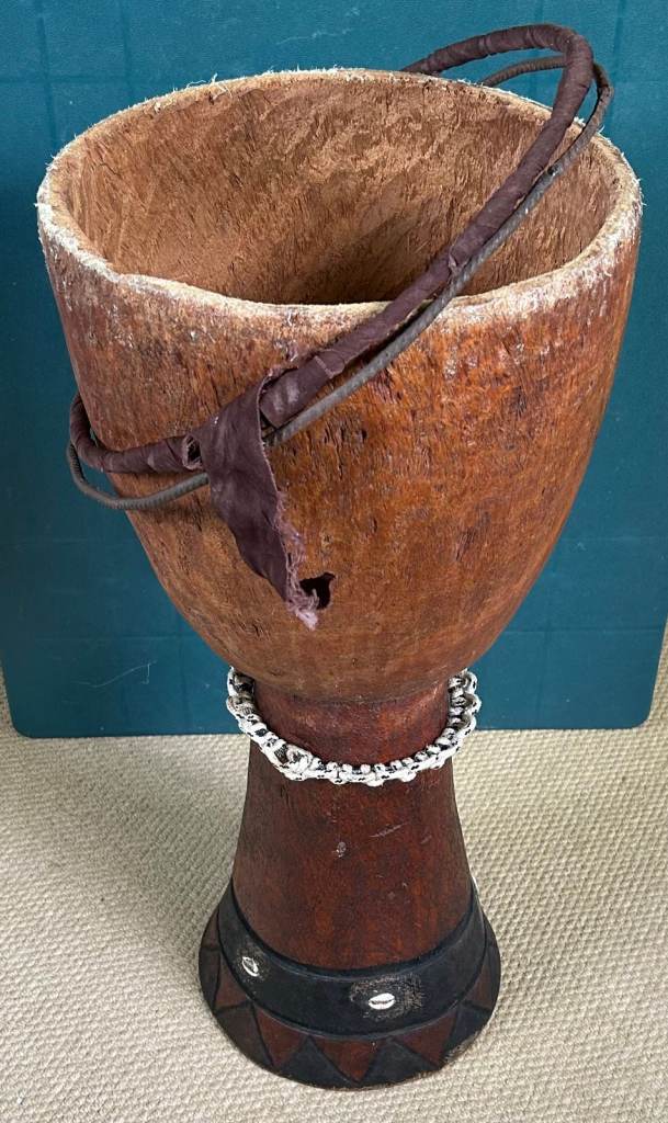 Genuine West African djembe drum with case. Drum needs re-skinning (see photos).