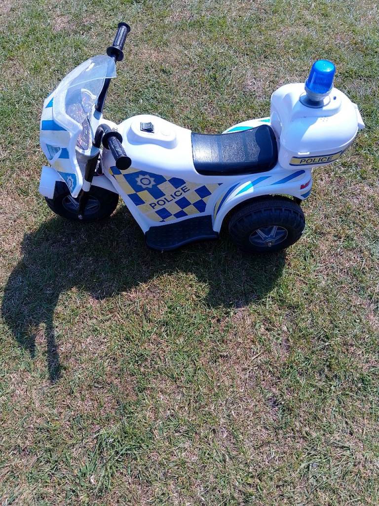 Police Kids Bike with Charger - used condition.