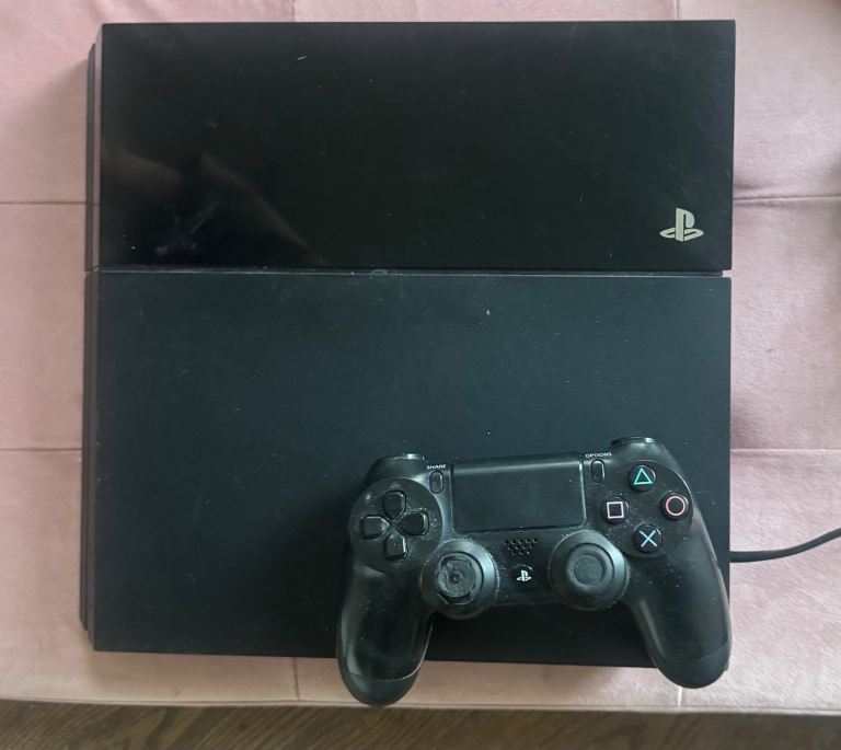 PlayStation 4 with 3 Games and Controller