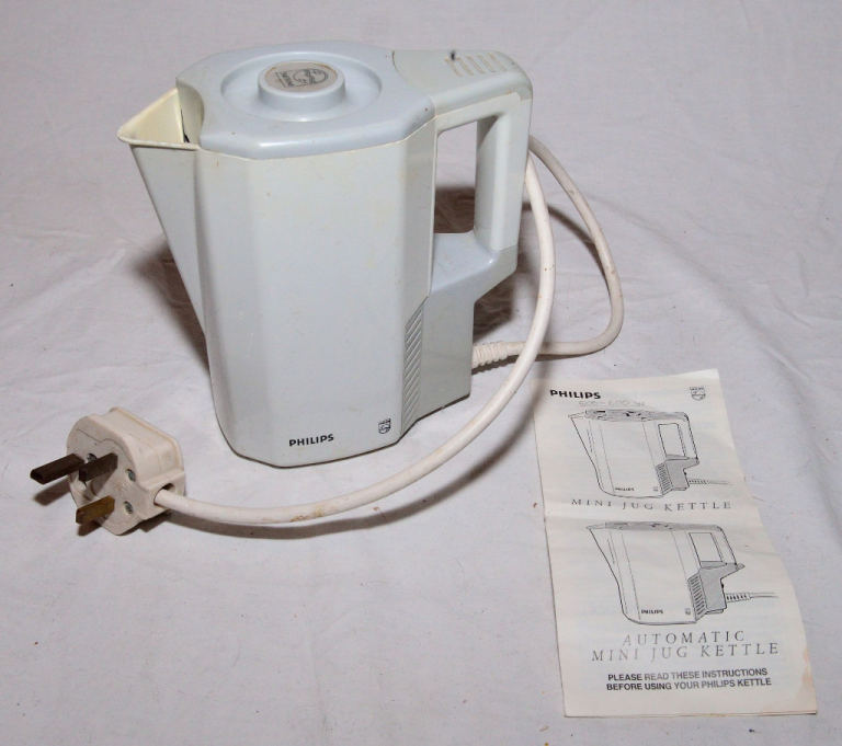 Philips HD4382 automatic electric 240V 600W mini jug kettle, 0.75 litres, with handbook