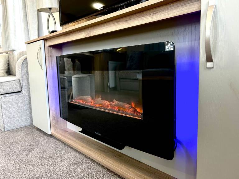 Own a caravan, repaying monthly, near Gt Yarmouth and Lowestoft