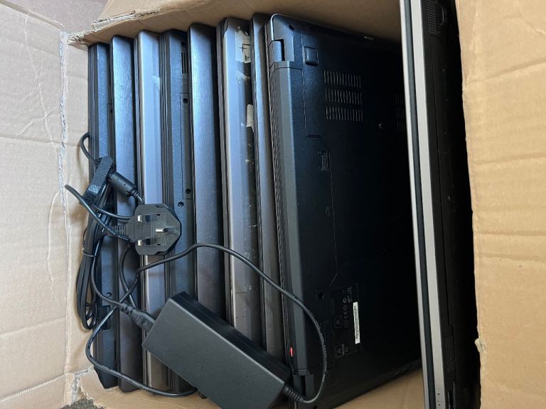 Box of 9 Assorted Laptops and Chargers – Spares/Repairs