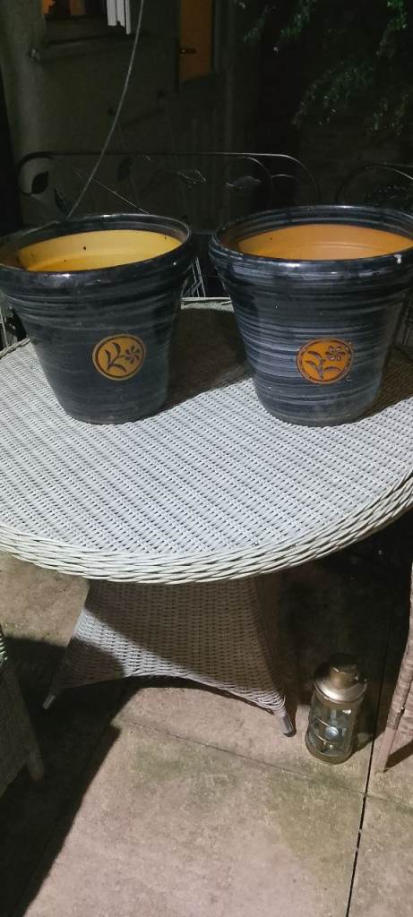 Two large ceramic plant pots
