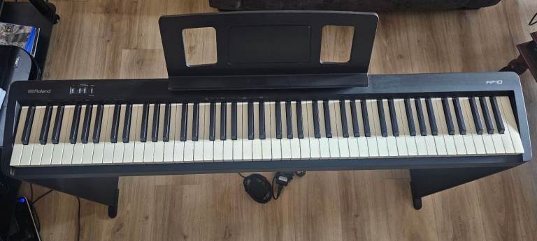 Roland FP-10 Digital Piano with Stand and Pedal.