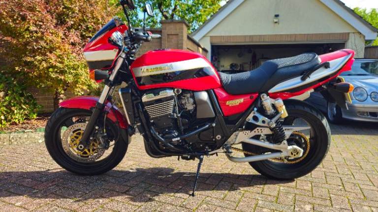 Kawasaki ZRX1100R Red and Black Virtually as new condition.