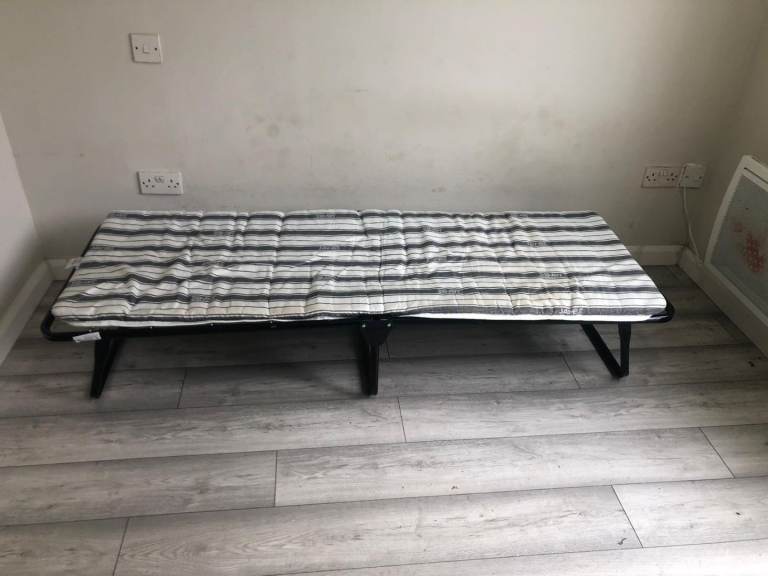 Single bed foldable spring with thin mattress 