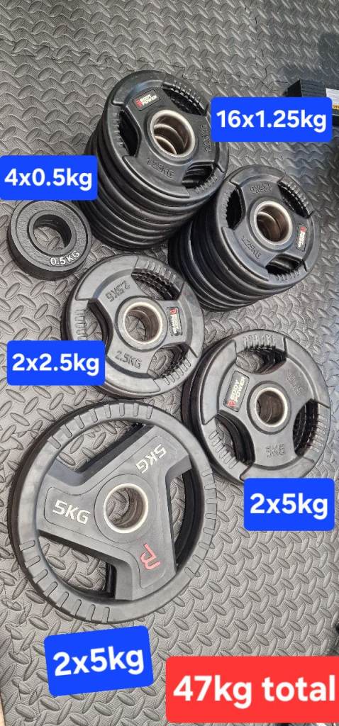 47 kg rubber coated Olympic Weight Plates (2"/50 mm)