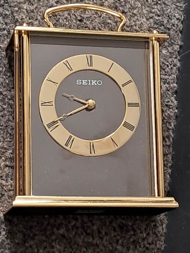 Solid heavy brass Seiko carriage clock perfect working order and condition no straches