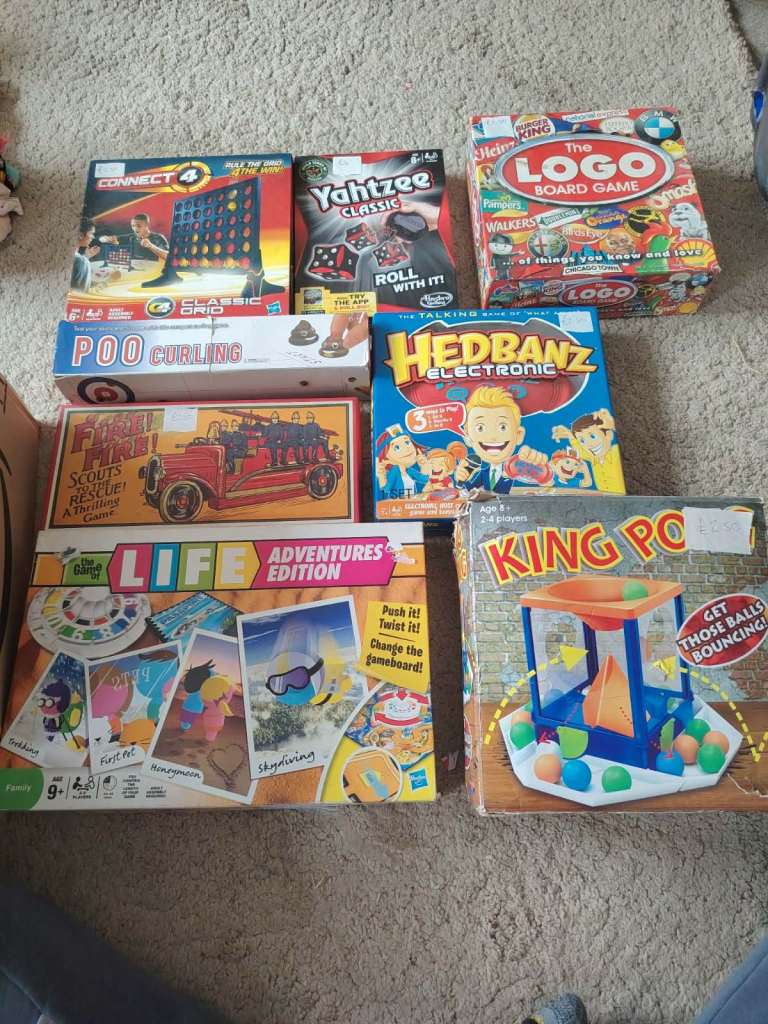 Bundle of various board games and kids' games