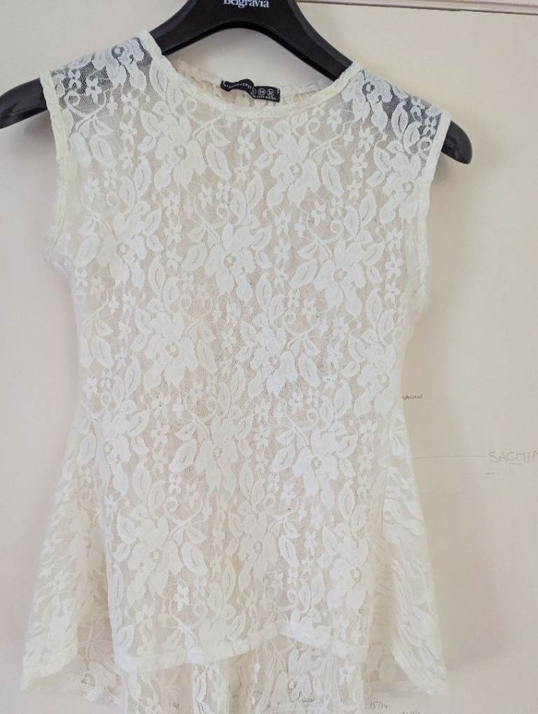 Gorgeous see through sleeveless top
