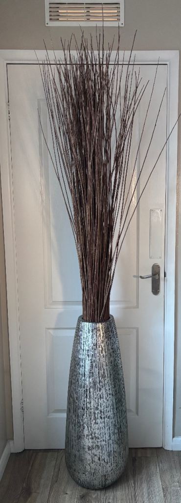 Large floor standing vase with twigs