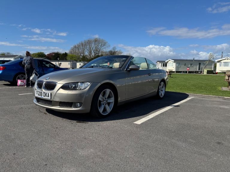 Convertible BMW 330i with only 70k miles 