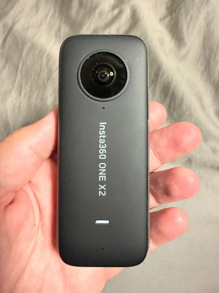Insta360 ONE X2 360-degree camera with extended stick