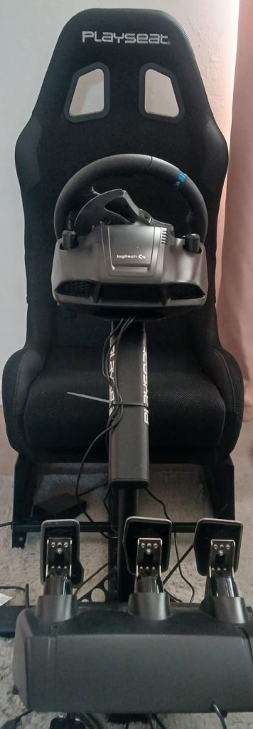 Racing seat pedals and steering wheel 