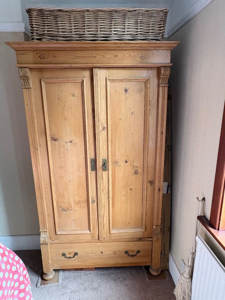 Antique stripped pine wardrobe