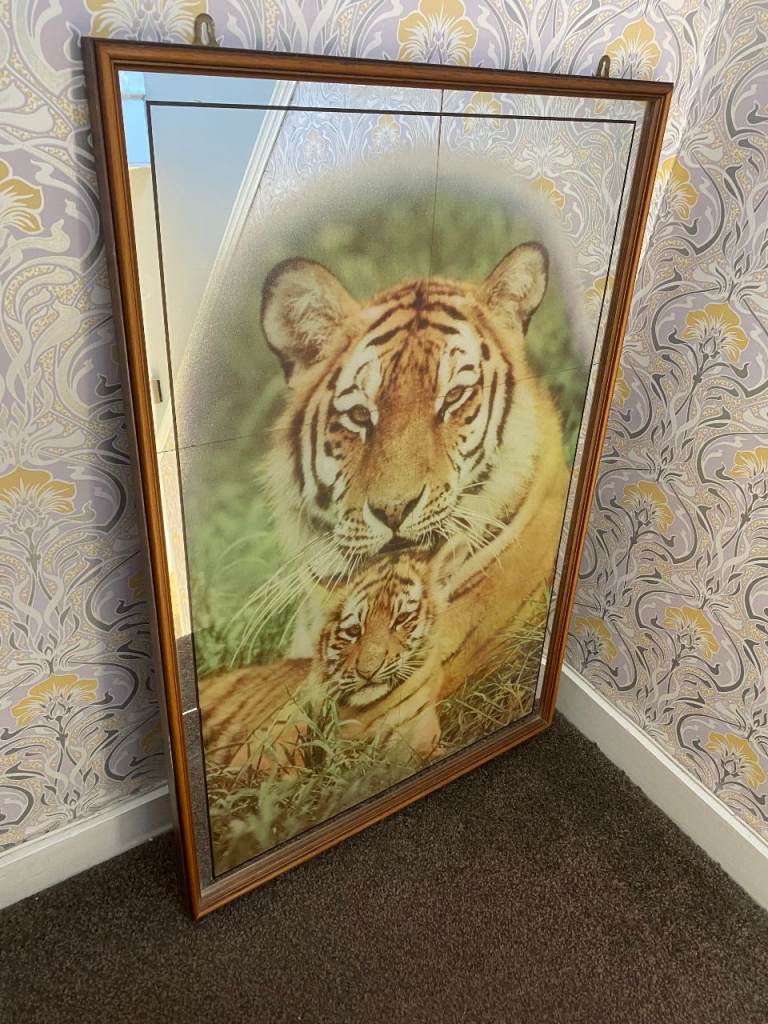 MIRROR WITH TIGER AND CUB IN THE BACKGROUND