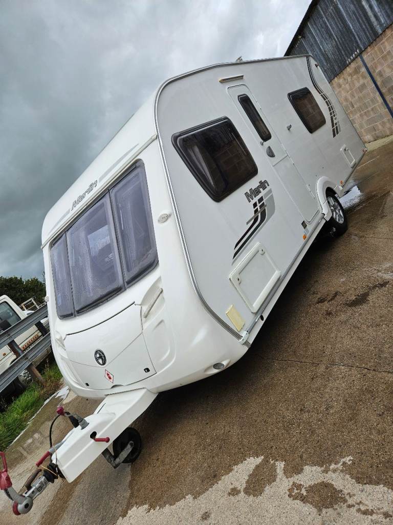 2010 Swift Merlin 545 - fixed bed, motor mover, full awning & accessories 