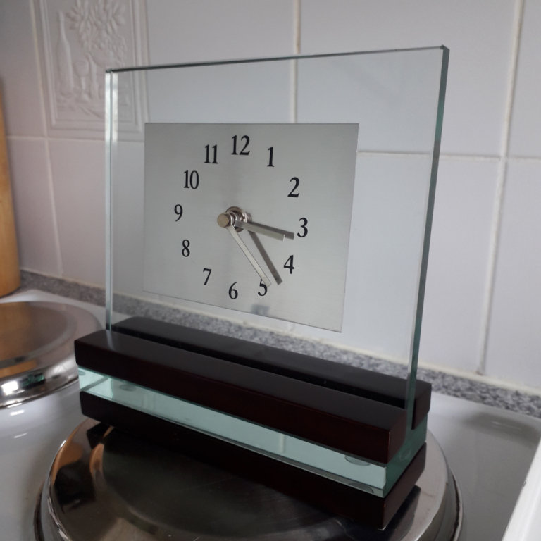 Glass and wood effect mantle clock