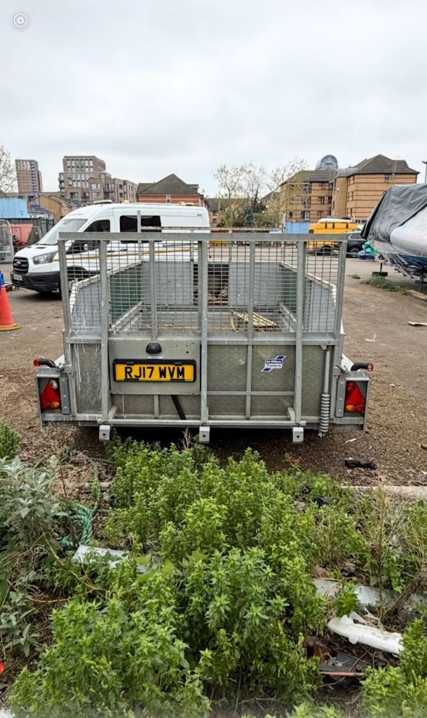 Robust Grey Four-Wheel Trailer – Fair Condition, Ready to Use