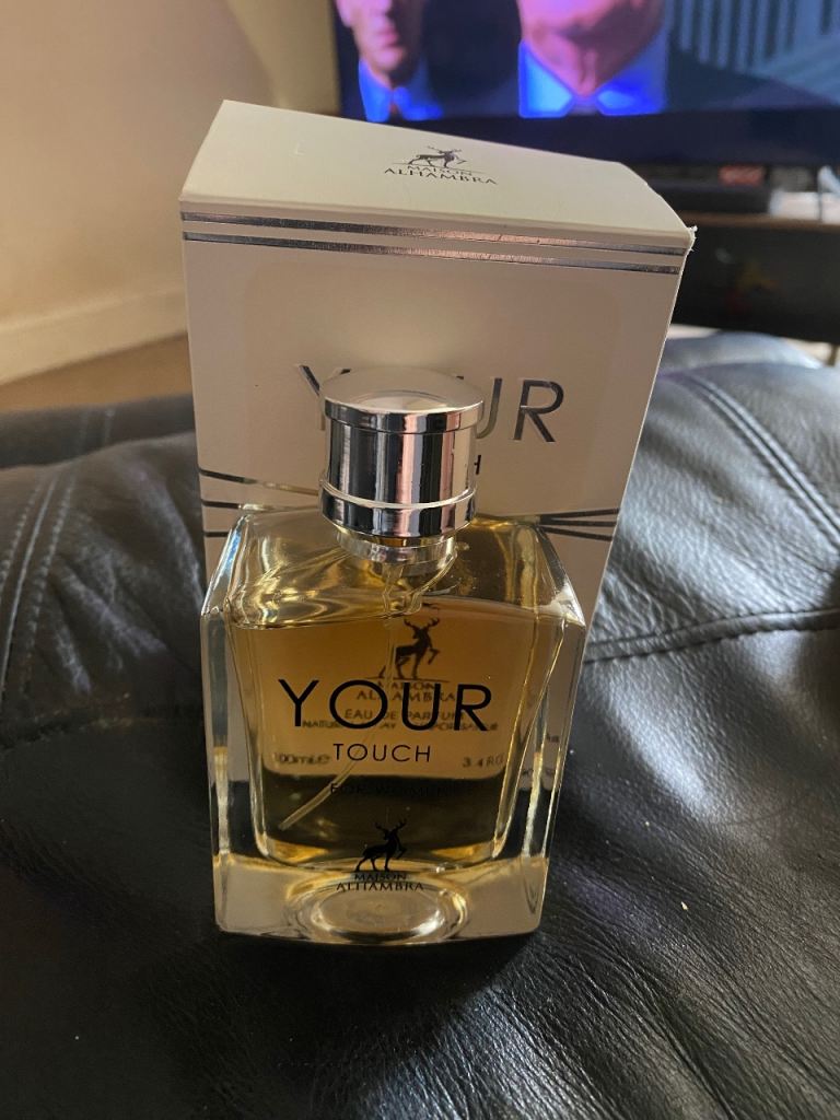 ladies perfume your touch smells like Armani 