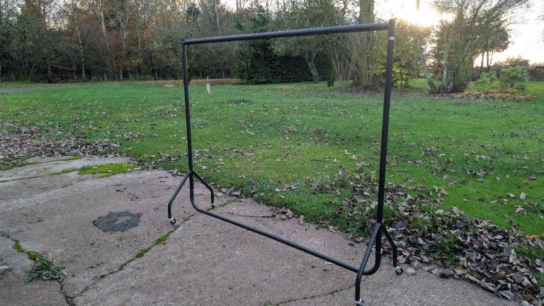 Metal clothing rack with wheels 
